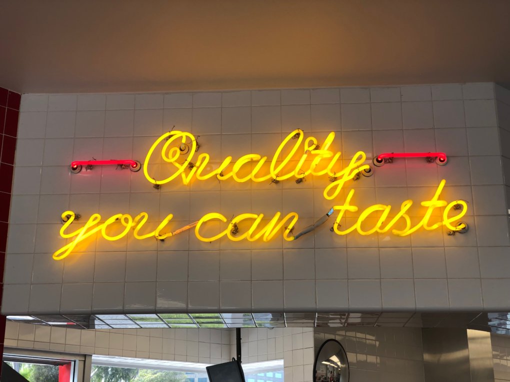 Neon sign "Quality you can taste" Neon sign "Quality you can taste"