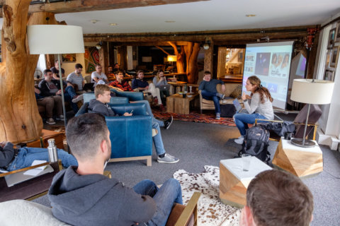 All-hands meeting in a lobby All-hands meeting in a lobby